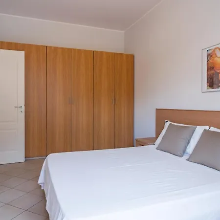 Residenza Al Porto Con Parcheggio アパートホテル スポトルノ
